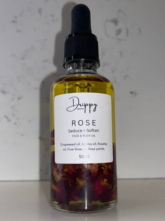 DRIPPY COSMETICSRose OilA heavenly scented blend of natural oils infused with the ancient symbol of love &amp; femininity, Roses.

Associated with Aphrodite (or Venus in the Roman tradition