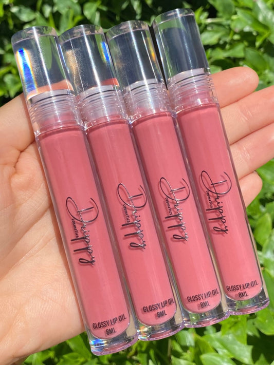 DRIPPY COSMETICSBlush Glossy Lip OilNot as thin as a lip oil &amp; not as thick and sticky as a Lip gloss. 
Our light-weight, silky formula gives you the shine of a Lip gloss with less stickiness and m
